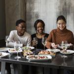 church members sharing a thanksgiving fellowship meal