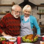 older adults sharing a thanksgiving meal together